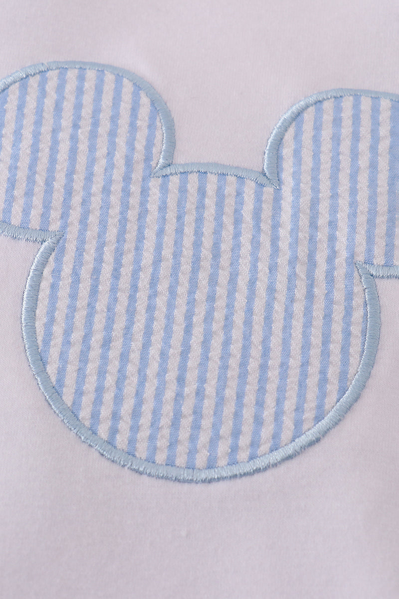 Blue character applique bubble